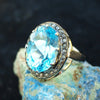 Amazing Blue Topaz and Diamond ring. Size 8
